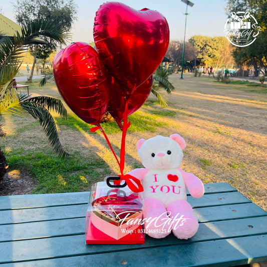 Transparent Handle Bag with Chocolate Heart, Flowers, Balloon & Teddy Bear
